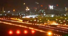 Boeing 747 wing hitting runway during landing.