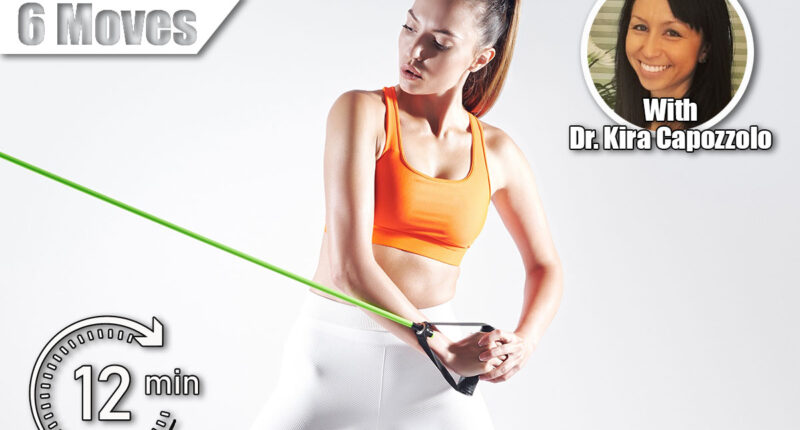 Concentrated woman using resistance band while exercising against white background. The 6 Best Exercises To Eliminate Love Handles. Cover