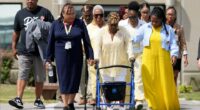 Relatives of victims leaving a maximum security institution after an execution.