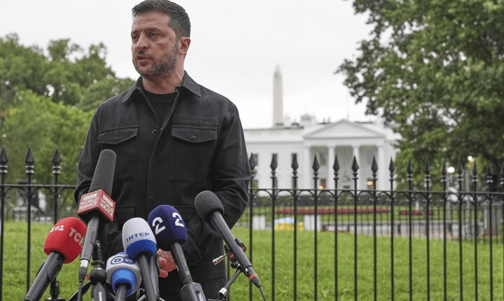 Volodymyr Zelenskyy giving a press conference outside the White House.