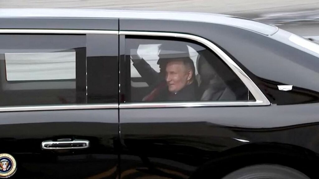 Trump and Putin's hold 10-minute secret meeting in the fortified Beast