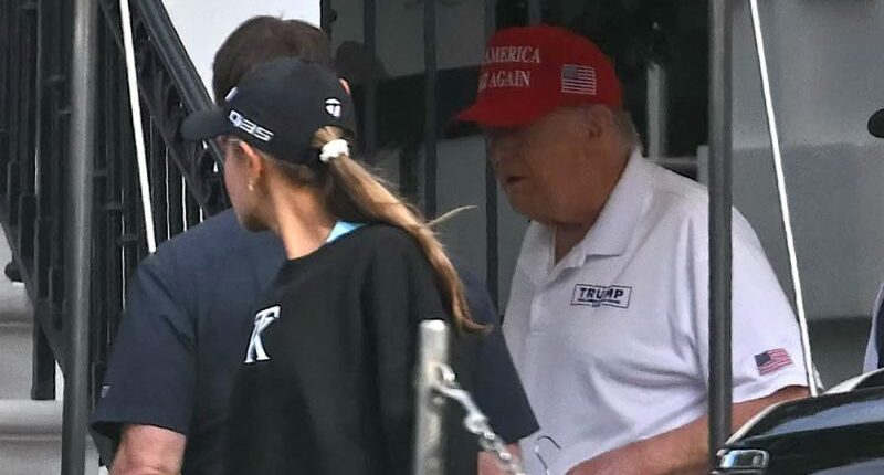 Trump dispels health rumors, hits golf course