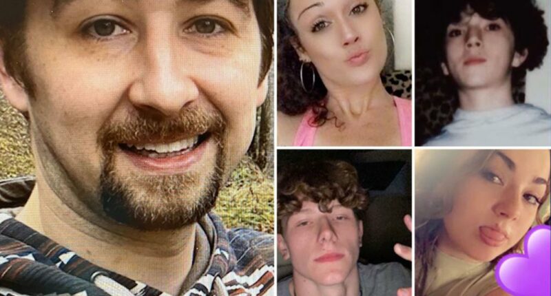Two charged with helping fugitive accused of killing Tennessee family