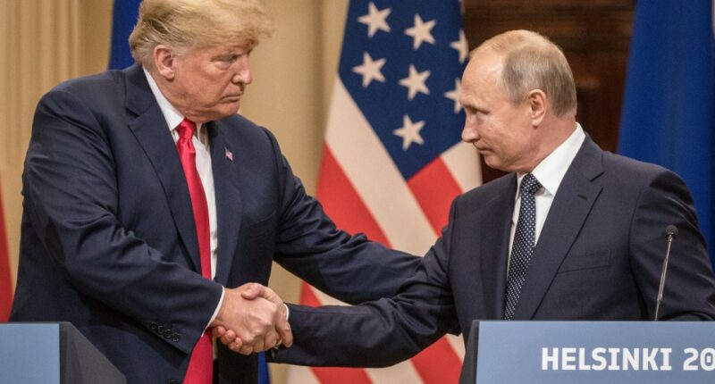Presidents Trump and Putin shaking hands at a press conference.