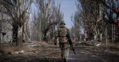 VELYKA NOVOSILKA, DONBAS, UKRAINE - MARCH 7: Ukrainian servicemen of the Ukrainian Volunteer Army patrol around the town of Velyka Novosilka, Ukraine March 7, 2023. The frontline around the city of Vuhledar, a strategic rail and road hub south of Bakhmut, resembles an apocalyptic scenario. Destroyed buildings and burned cars are scattered at both sides of the road. There, hidden on basements of abandoned houses, the Ukrainian Volunteer Army hold their positions against relentless attacks by Russian forces. Under the threat of the enemyâs artillery, that echoes through the village, soldiers hold their fortified positions in shifts of 12h. In recent days, they said, they have been able to repel several Russian offensives. (Photo by Ignacio Marin Fernandez/Anadolu Agency via Getty Images)
