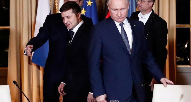 Zelensky and Putin at a meeting in Paris.