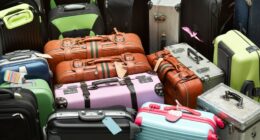 Pile of various suitcases.
