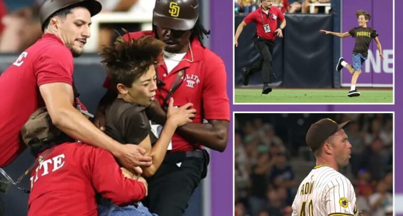 Young kid tackled by Padres security after invading field — and fans were not happy