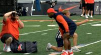 'Just a normal guy' Humility on display for NFL great turned Illini assistant coach
