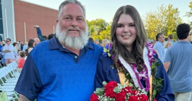 Jessie Marchant and her father at graduation from East Grand Rapids High School. (Courtesy Chloe Brown)