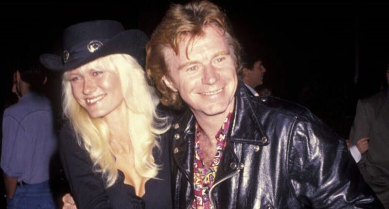 70s rock legend's wife shares hospital update after claim singer 'died in my arms'