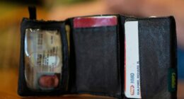 A Michigan autoworker's wallet is found under a hood in Minnesota — 151,000 miles later