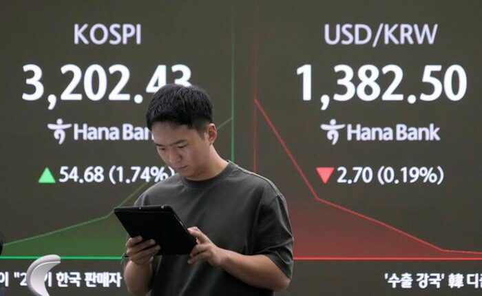 Asian shares advance, tracking rally on Wall Street