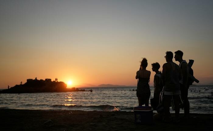 Beach on a budget: Greeks settle for day trips, priced out of iconic destinations