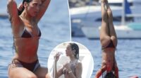 Bikini-clad Dua Lipa flaunts shredded abs during paddleboard yoga in Ibiza