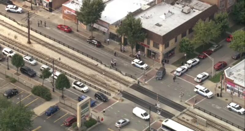 Chicago police shooting: Officer shoots at armed suspect on 71st Street in South Shore, CPD says