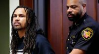 Cincinnati brawl's 'main instigator' is hauled into court for 'knocking woman unconscious' before DANCING and taunting victims