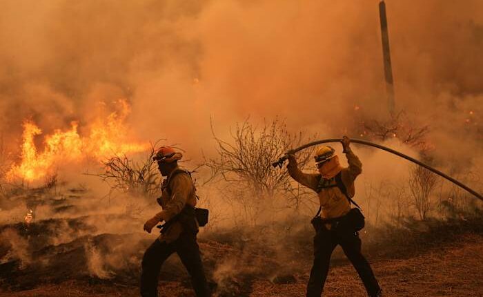 Colorado prison evacuated as growing wildfire becomes one of the largest in state history