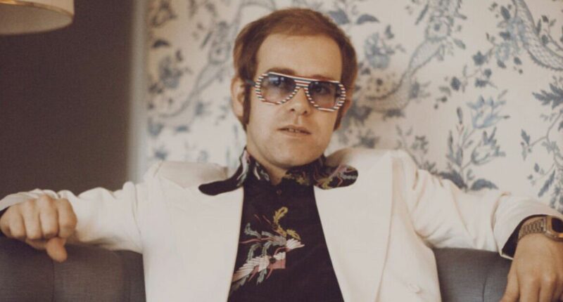 Elton John had no cash leaving fiancée to pay for everything and ‘went everywhere by bus’