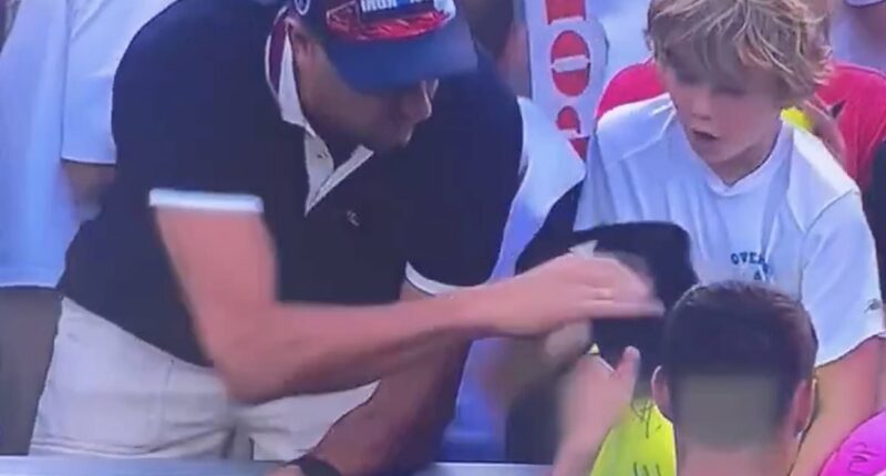 Fans unleash on the worst ever action by shameless spectator after footage showed young boy being robbed of souvenir
