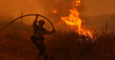 Fast-growing brush fire forces thousands to evacuate north of Los Angeles