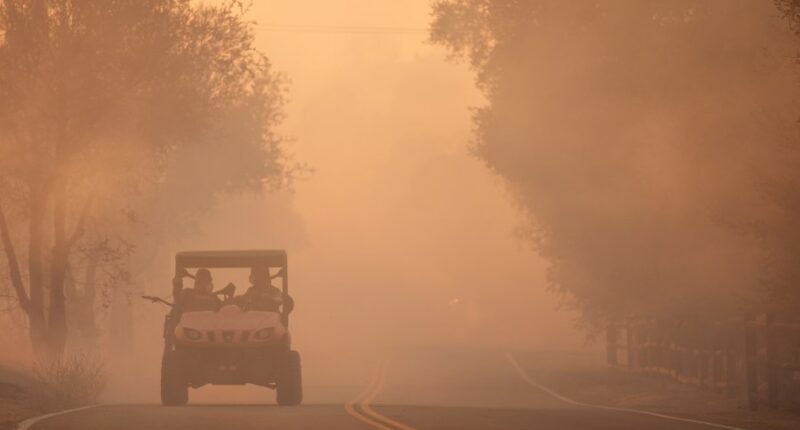 Firefighters make progress against blaze that forced thousands to flee north of Los Angeles