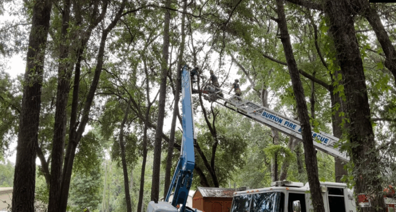 Firefighters rescue worker trapped 40 feet above ground