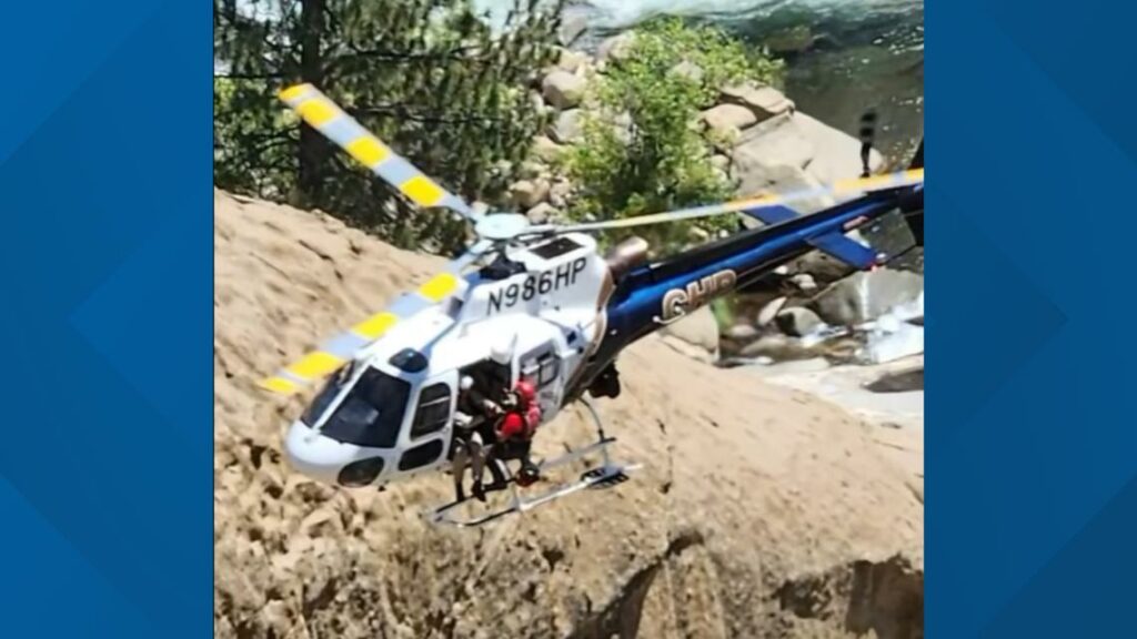 Helicopter team rescues man trapped behind California waterfall