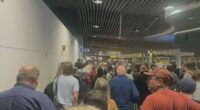 Hundreds of travellers forced out of Brisbane Airport after metal detector fails