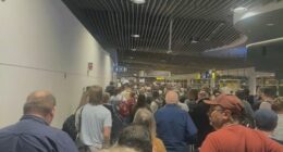 Hundreds of travellers forced out of Brisbane Airport after metal detector fails