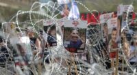 Pictures of Israeli hostages held in Gaza during a demonstration outside the Kirya military headquarters in Tel Aviv, Israel, on August 2