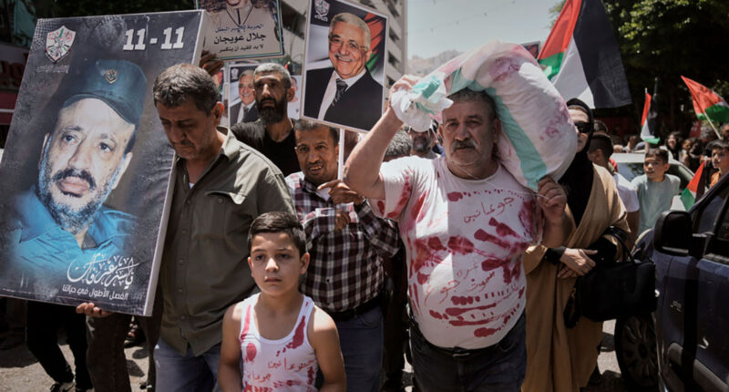 Israeli minister prays at flashpoint holy site as officials say 33 aid-seekers killed in Gaza