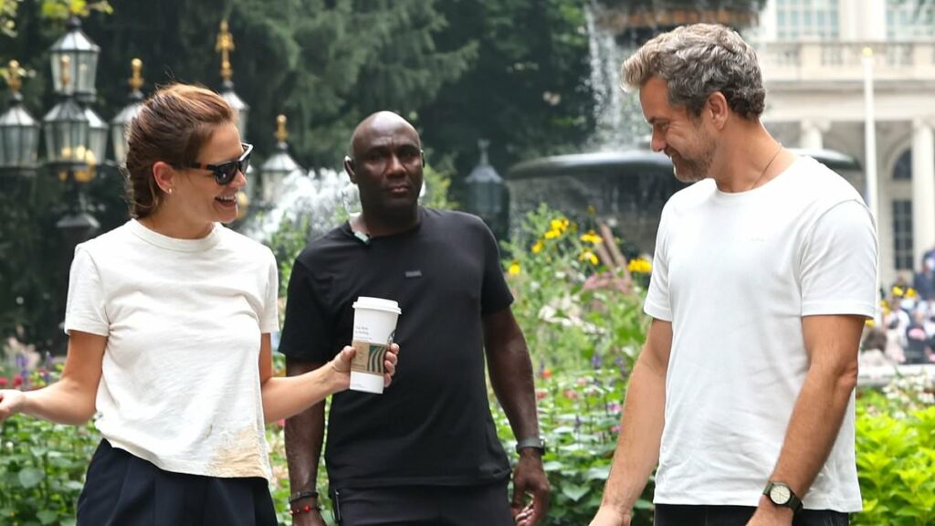 Katie Holmes and her ex Joshua Jackson hold hands and hug