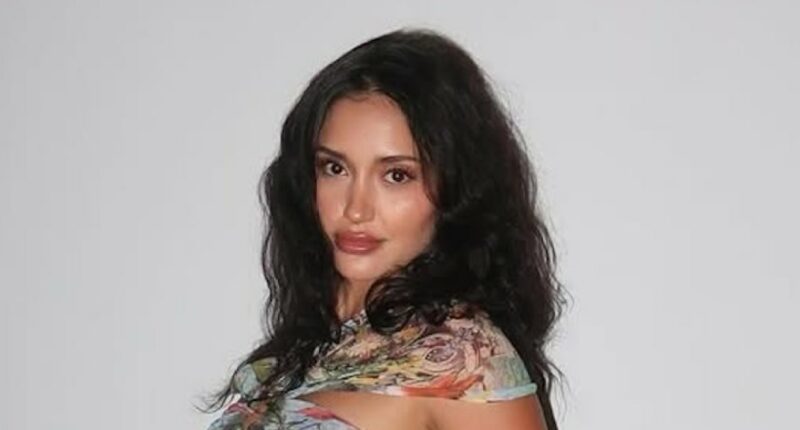 Leah Kateb Slams a Troll Claiming She’s Sticking Her Chest Out in Photos