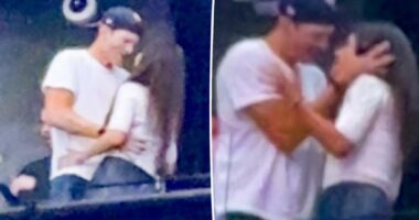 Mila Kunis and Ashton Kutcher show rare PDA at Backstreet Boys concert while getting their groove on