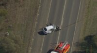 Two drivers have died after a head-on collision near Melbourne after a vehicle sped past a police operation.