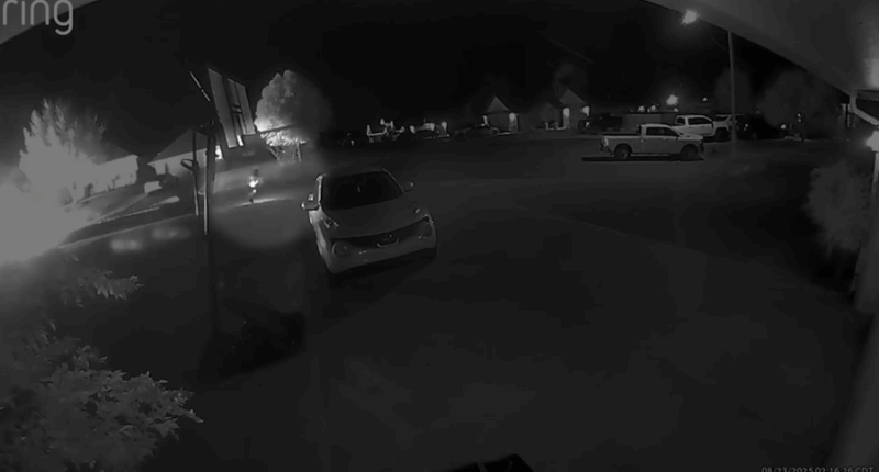 Neighbor's camera captures moment deputy's vehicles set on fire