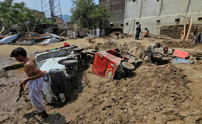 Pakistan expands rescue and relief efforts after floods kill over 200 in a single district