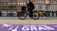 Police praise Oxford Street redesign with huge signs warning of phone thieves as one mobile is stolen every 15 minutes