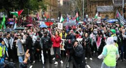 Pro-Palestine protesters chant outside the State Library of Victoria on August 03, 2025 in Melbourne, Australia. Protesters in Sydney and Melbourne joined marches and actions globally, as pressure mounts on the Israeli government over a devastating humanitarian crisis unfolding as its war against Hamas continues. (Photo by Asanka Ratnayake/Getty Images)