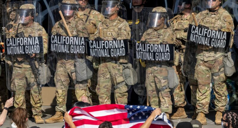 Protesters confront California National Guard soldiers and police