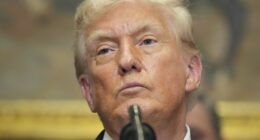 President Donald Trump listens during an event to sign an executive order restarting the Presidential Fitness Test in public schools, Thursday, July 31, 2025, in the Roosevelt Room of the White House in Washington. (AP Photo/Jacquelyn Martin)