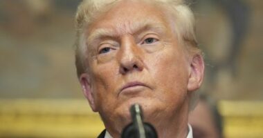 President Donald Trump listens during an event to sign an executive order restarting the Presidential Fitness Test in public schools, Thursday, July 31, 2025, in the Roosevelt Room of the White House in Washington. (AP Photo/Jacquelyn Martin)