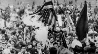APRIL 15, 1967: An American flag burns in the Sheep Meadow of Central Park as peace marchers warm to the task of marching to the UN in protest of the war in Vietnam. A crowd estimated at 125,000 marched through midtown for the "Spring Mobilization Against the War in Vietnam." (Photo by Leonard Detrick/NY Daily News Archive via Getty Images)