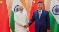 Xi and Modi talk friendship in a 'chaotic' world as Trump's tariffs bite