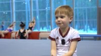 Vladimir Putin's six-year-old son in a gymnastics gym.