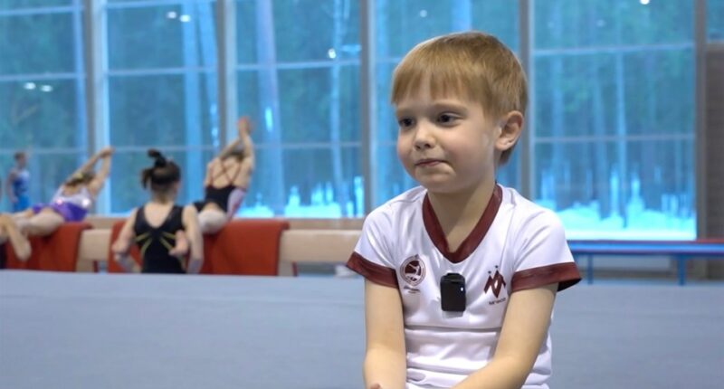Vladimir Putin's six-year-old son in a gymnastics gym.
