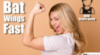 Close-up profile side view portrait of her she nice-looking lovely attractive cheerful cheery ecstatic satisfied wavy-haired lady showing muscles isolated over beige pastel background. 5 Standing Exercises That Banish Bat Wings Faster Than Push-Ups After 45. Cover