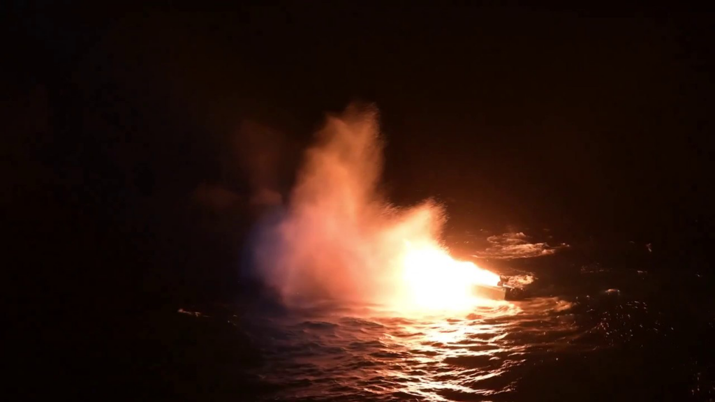Coast Guard burns, sinks suspected 'drug boat,' apprehends 7 alleged drug smugglers: video