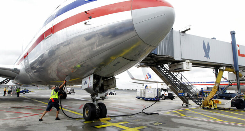 Developing: Body Discovered in Wheel Well of American Airlines Plane